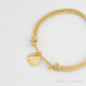 Pulsera cordón beige con colgante abuela